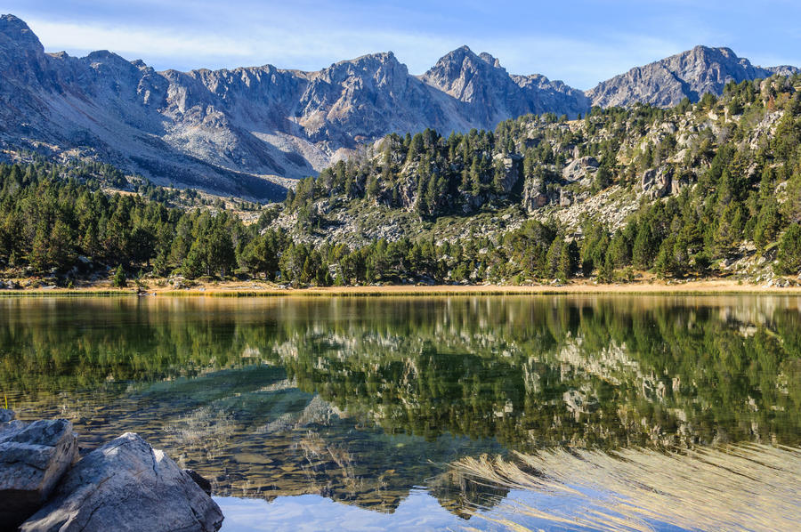 Reflection at the first lake in the circuit of Lake Pessons, Andorra