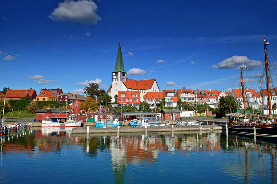 Roenne harbor and church seen from the sea, Bornholm, Denmark