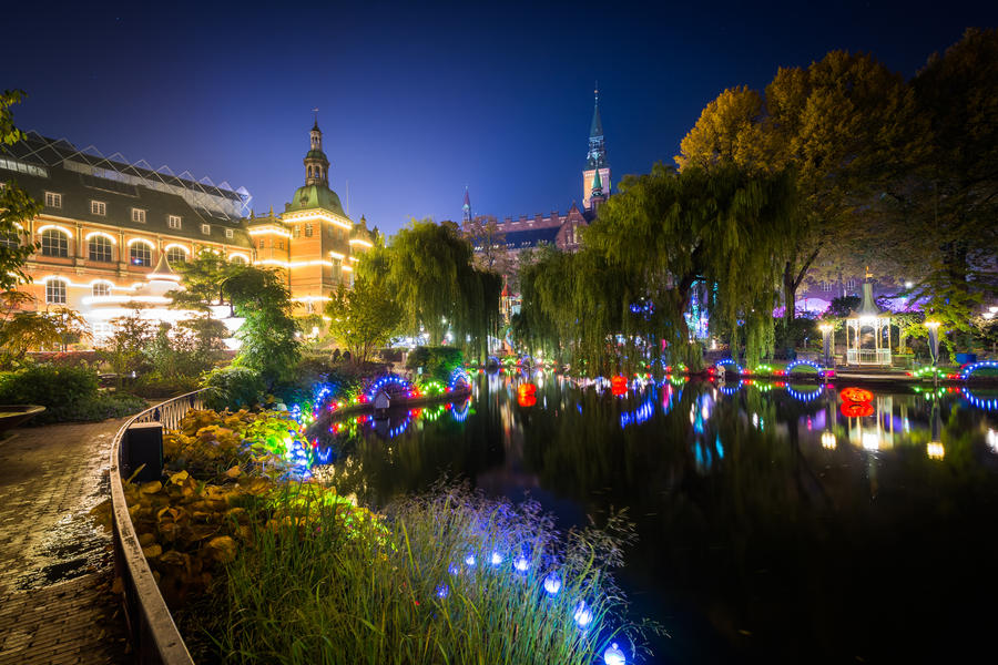 The lake at Tivoli Gardens at night, in Copenhagen, Denmark.