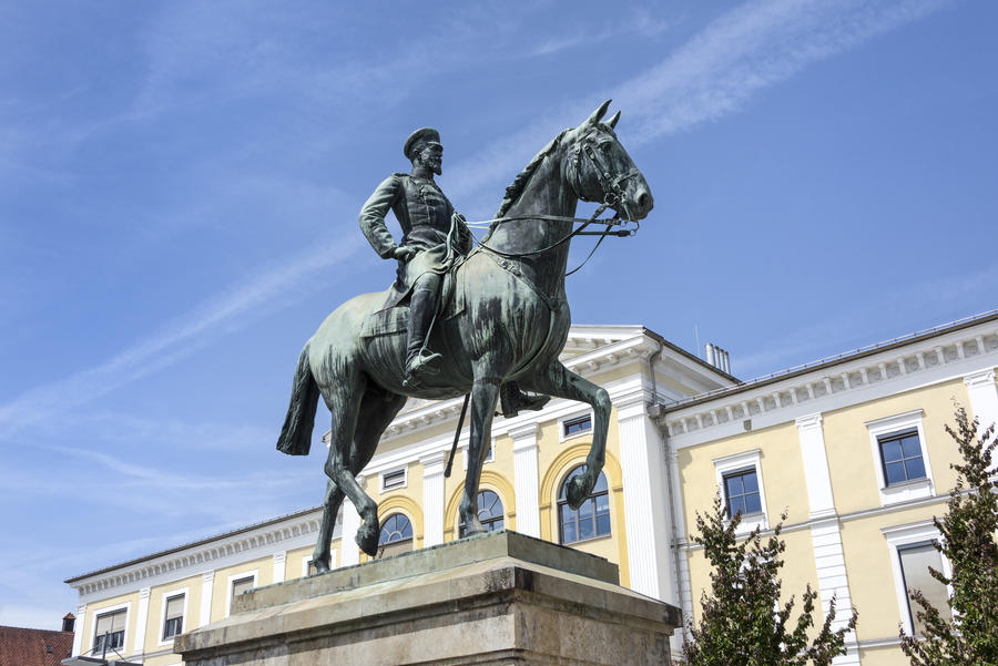 Germany, Sigmaringen, upper Danube: Famous equestrian statue of Leopold, Prince of Hohenzollern (Fuerst von Hohenzollern) in the city center of the ancient German town with blue sky in the background.