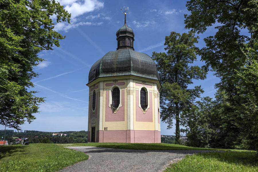 Germany, Sigmaringen, upper Danube: Famous Joseph chapel (Josefskapelle) with park, blue sky and green trees above city center of the German town - concept travel architecture activity history.
