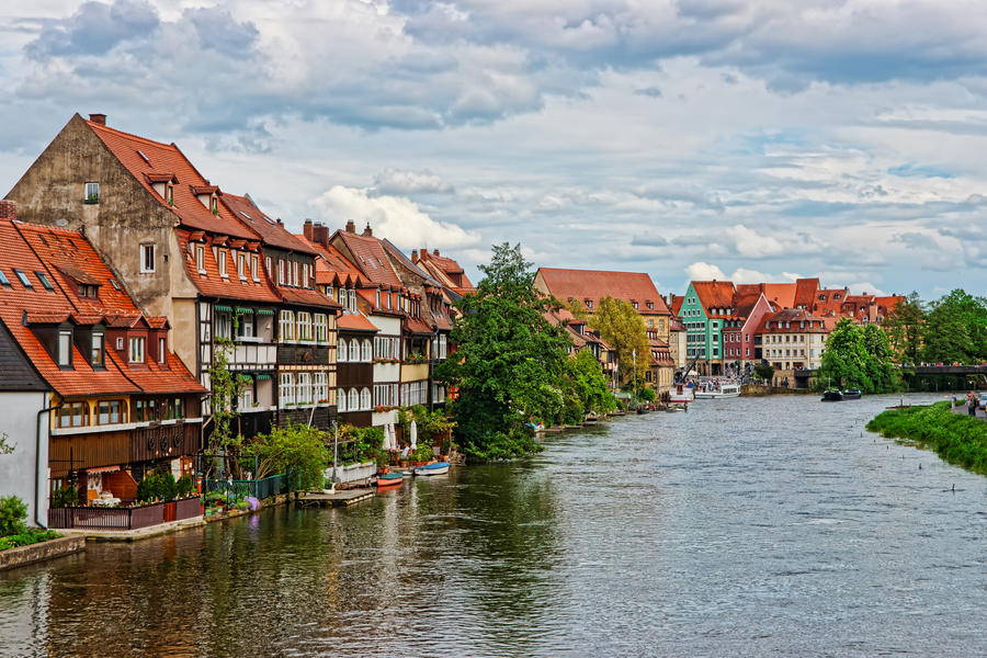 Colorful Fishermen houses and Regnitz River in the Little Venice in Bamberg in Upper Franconia, Bavaria, Germany.