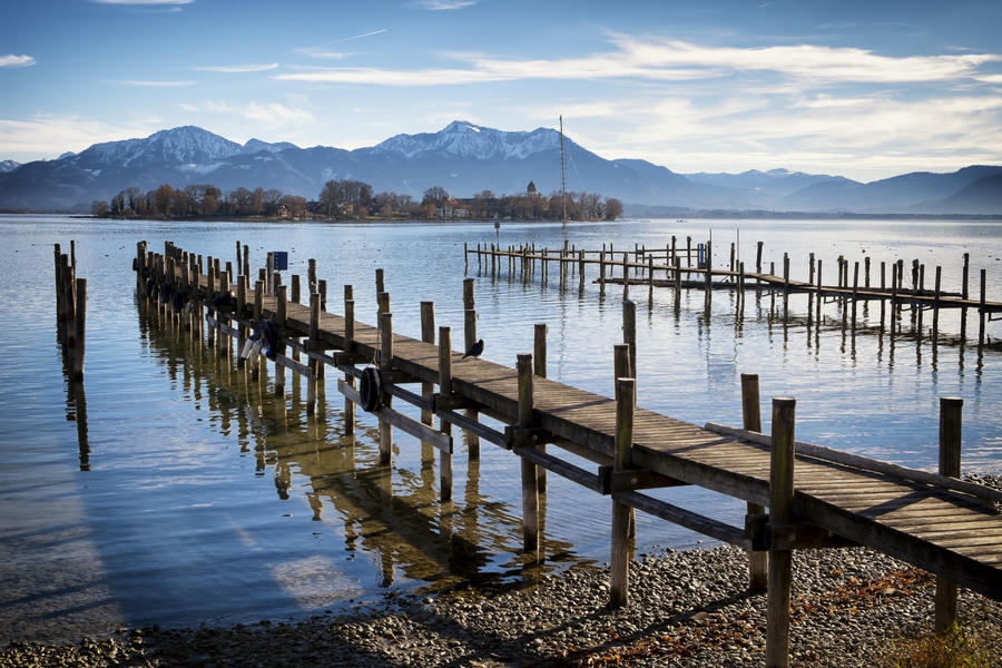 old wooden jetty at the chiemsee lake in bavaria