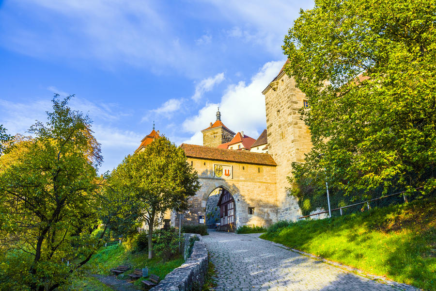Rothenburg ob der Tauber, old famous city from medieval times seen from the romantic valley of the river Tauber
