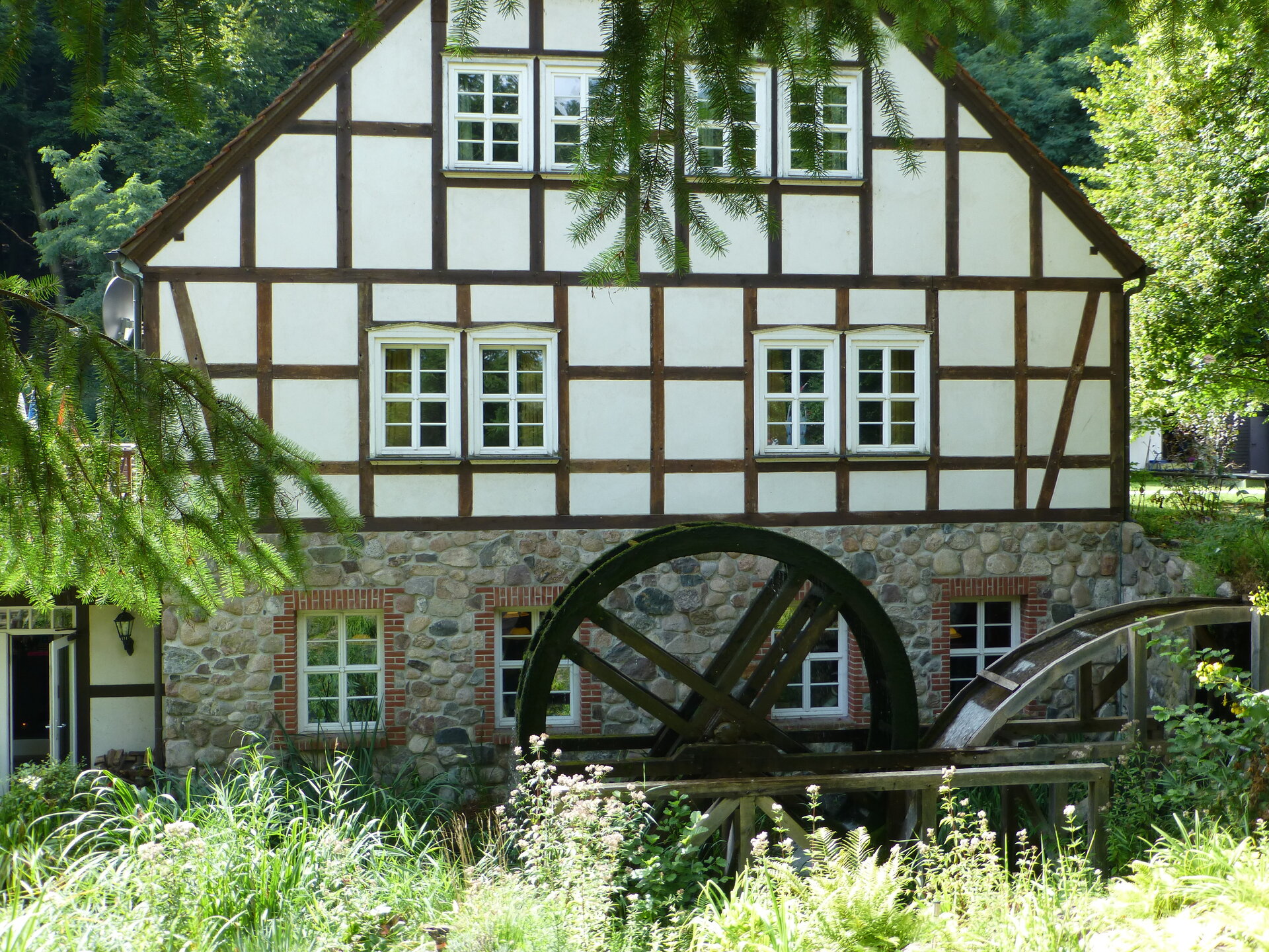 Bolten mill (in german Boltenmühle) Brandenburg, Germany with waterwheel. The mill was built in 1718.
