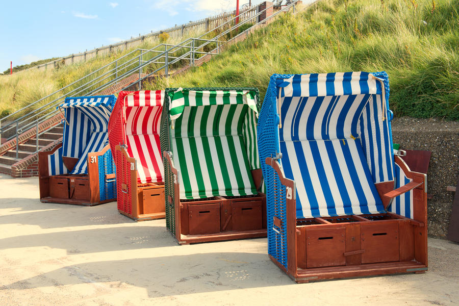 Colorful beach chairs with stripes on Borkum island