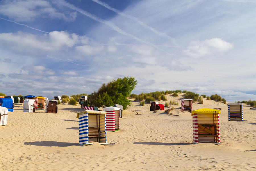 Beach chairs on the beach of Borkum island. North sea.
