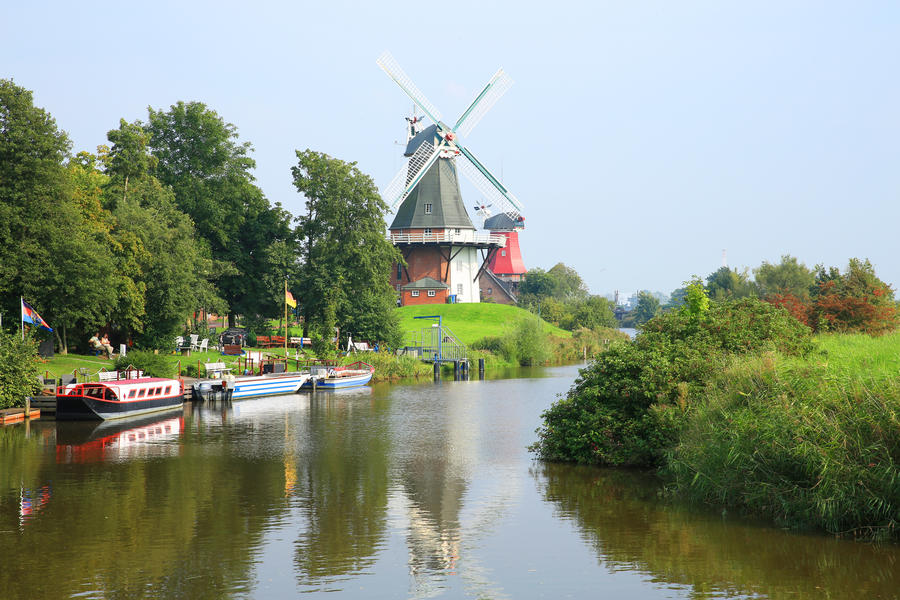 Historic windmills in Greetsiel, Ostfriesland, Lower Saxony, Germany