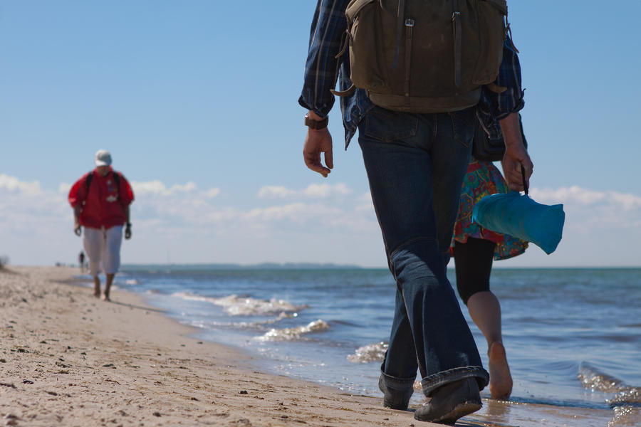 Wanderer walking at the beach