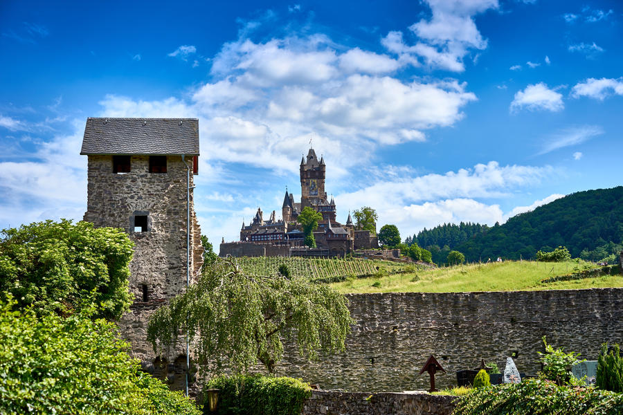 Valley of Moselle in germany / City of Cochem with "Reichsburg Castle" in wine growing area of Moselle / Historic city in Germany
