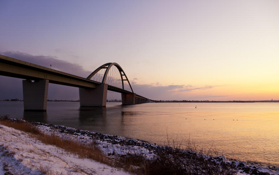 Fehmarn Sound Bridge at the Baltic Sea at sunset