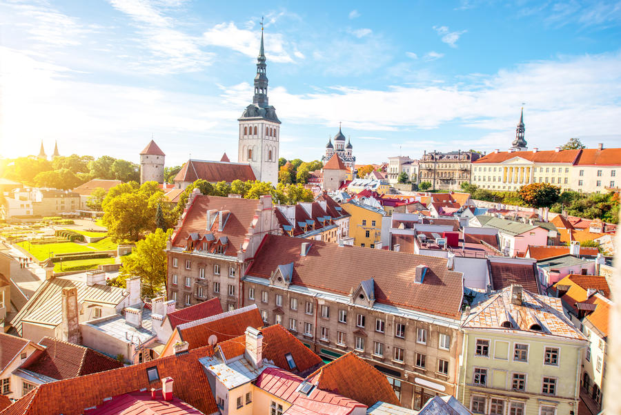 Cityscape aerial view on the old town with saint Nicholas church tower and Toompea hill in Tallin, Estonia
