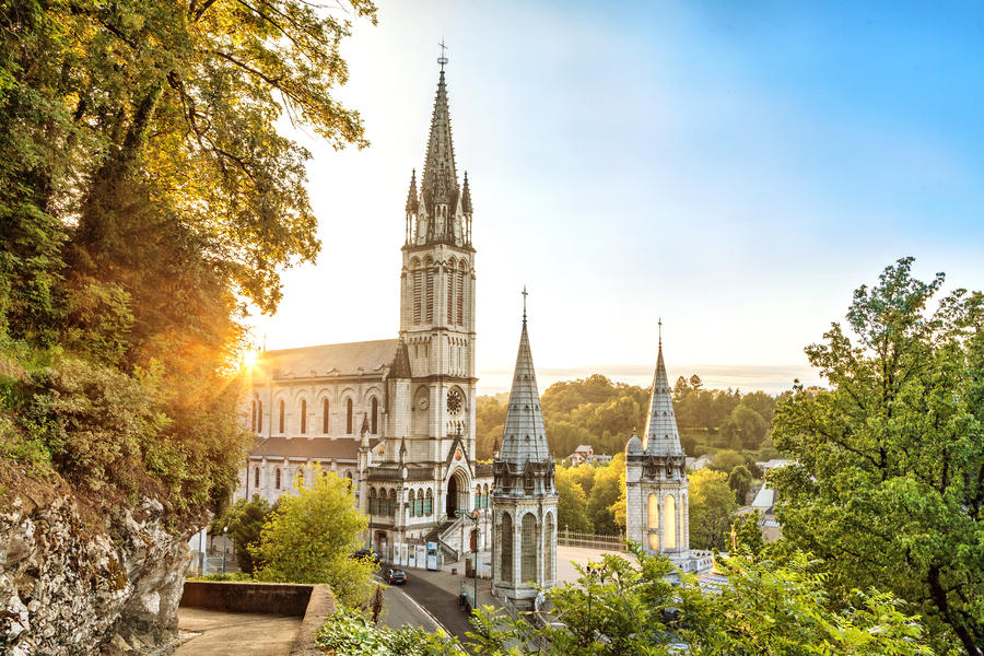 Rosary Basilica on sunset in Lourdes, Hautes-Pyrenees, France