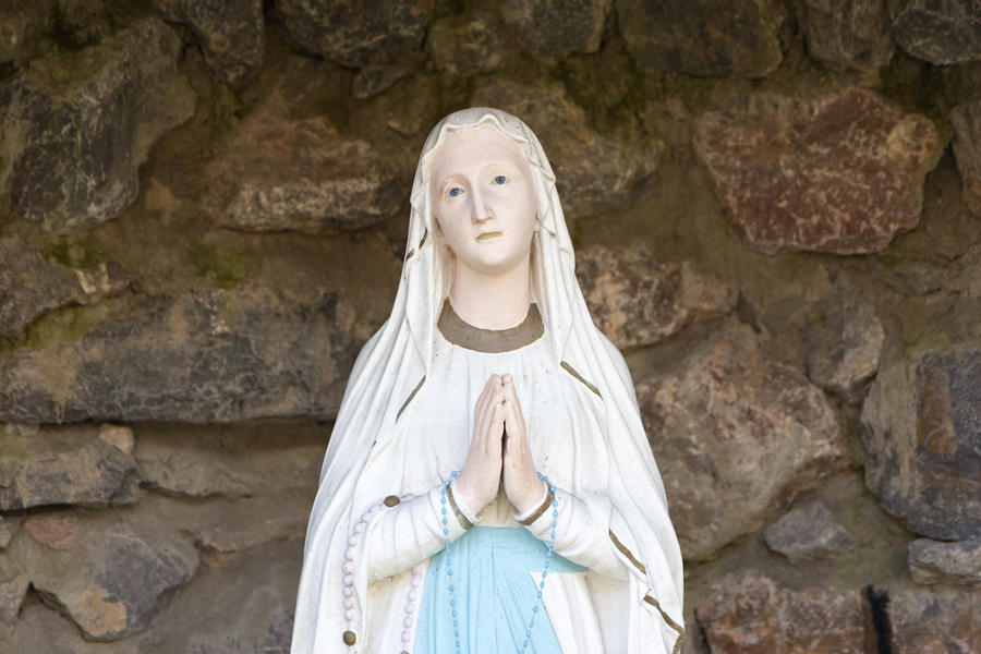 The statue of Our Lady of Lourdes (Notre Dame de Lourdes in French) - Holy Mary the Mother of God