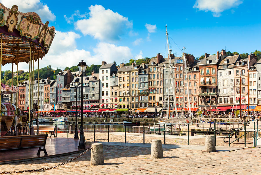 Honfleur, Normandy; Carousel and Restaurants near the historic Harbour