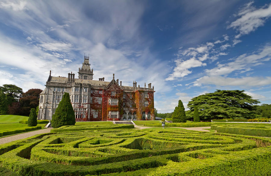 Adare manor in red ivy and gardens in Ireland