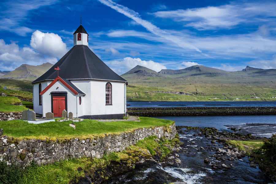 Small village church with cemetery in Faroe Islands, Denmark