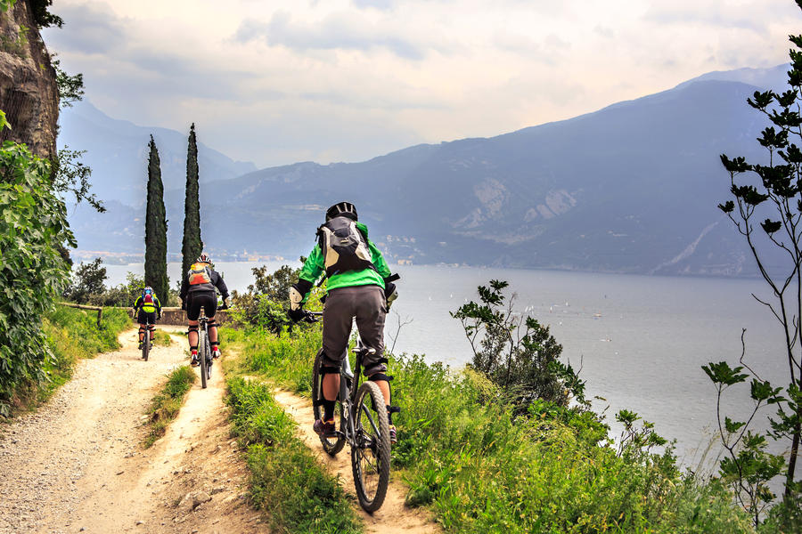 Group of biker in front of Garda lake in Italy