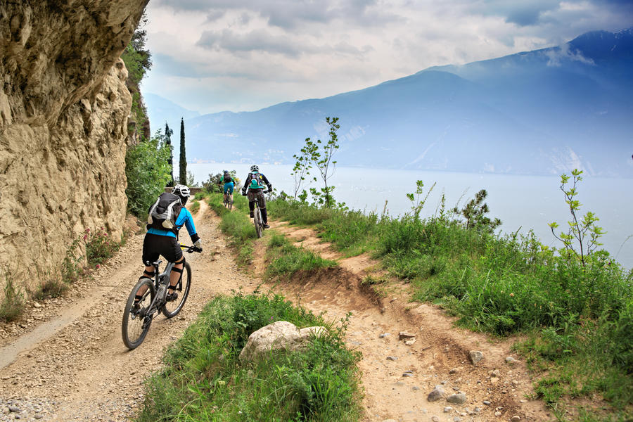 Group of biker in front of Garda lake in Italy