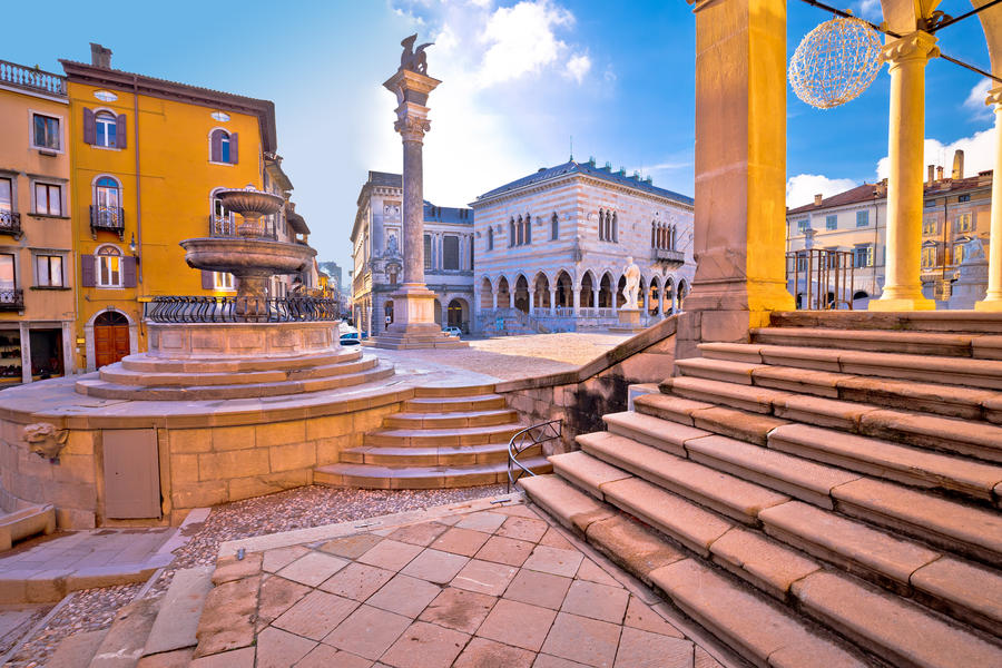 Ancient Italian square arches and architecture in town of Udine, Friuli Venezia Giulia region of Italy