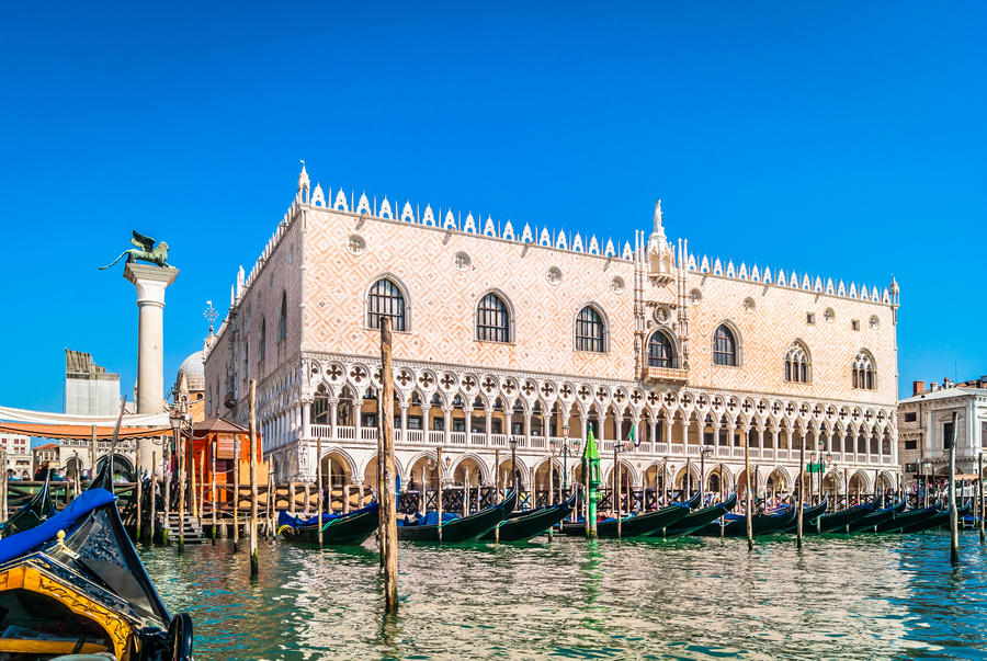 Waterfront view at Doge's Palace in famous Venice city, view from gondola ride. / Doge's Palace waterfront view. / Selective focus.