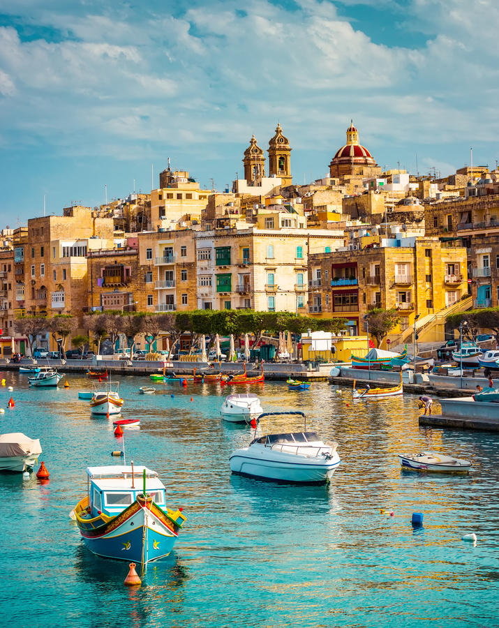 beautiful view on Birgu and the harbour with colorful boats in Malta