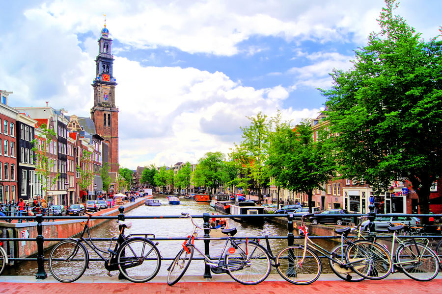 Bicycles lining a bridge over the canals of Amsterdam, Netherlands