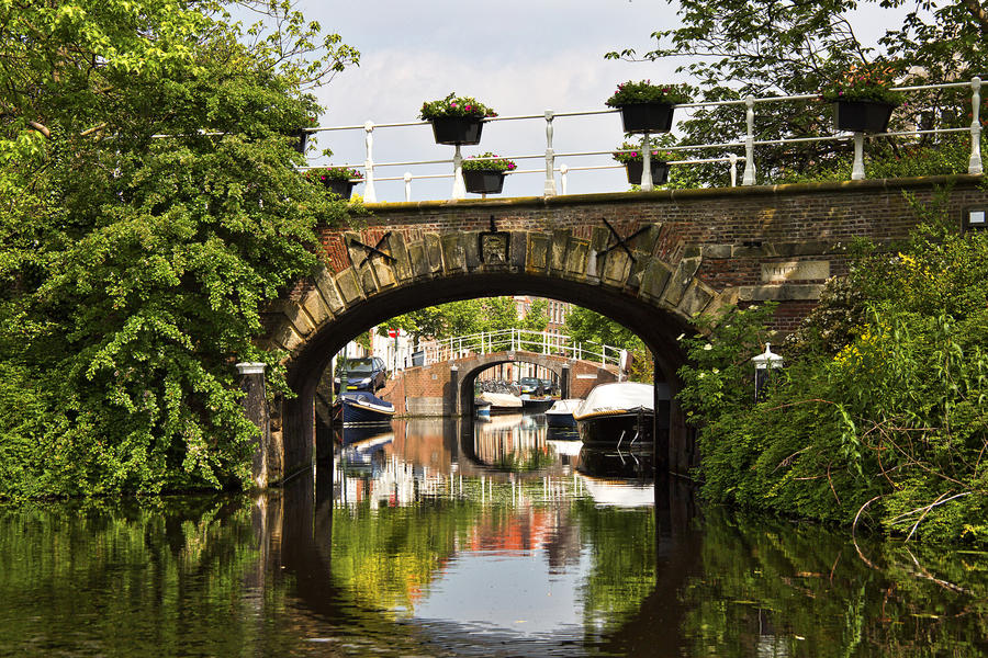 Bridges over the canals: Several canal bridges in Leiden, Netherlands. Telescopic scene.