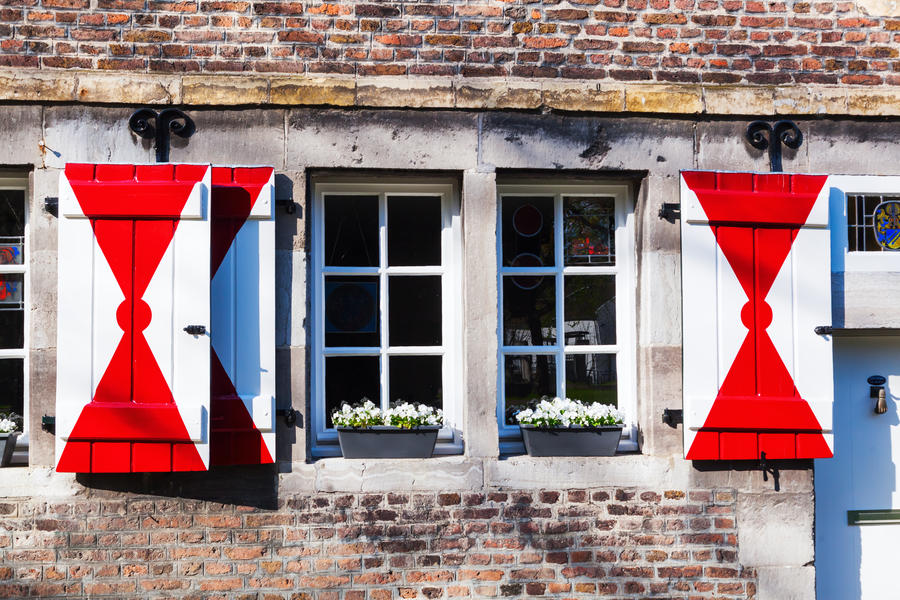 typical Dutch window at an old stone building in Maastricht, The Netherlands