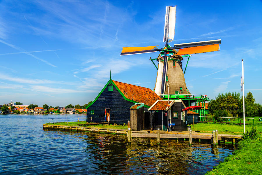 Fully Operational Historic Dutch Windmill in Zaanse Schans on the Zaan River in the Netherlands