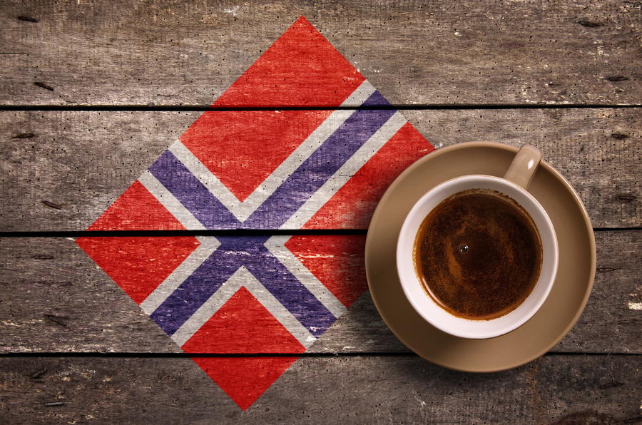 Norway flag with coffee on table. top view