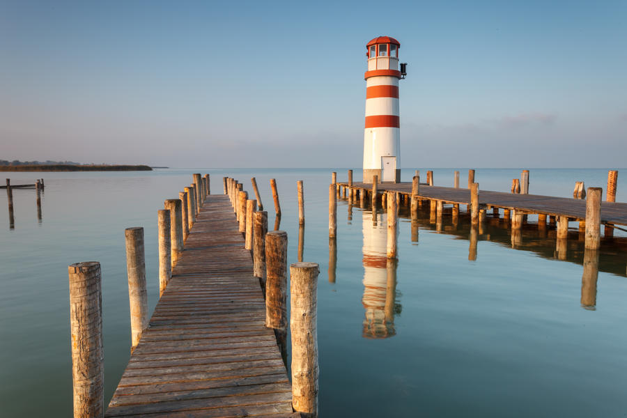 Lighthouse at sunrise in Podersdorf am See, lake Neusiedler See, Burgenland, Austria