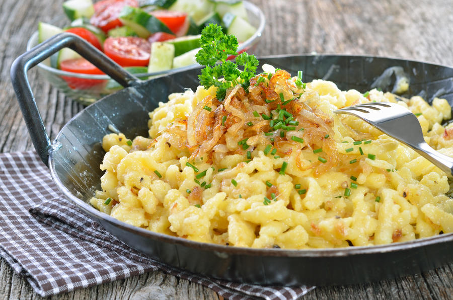 Southern German cheese noodles (spaetzle) in a serving pan