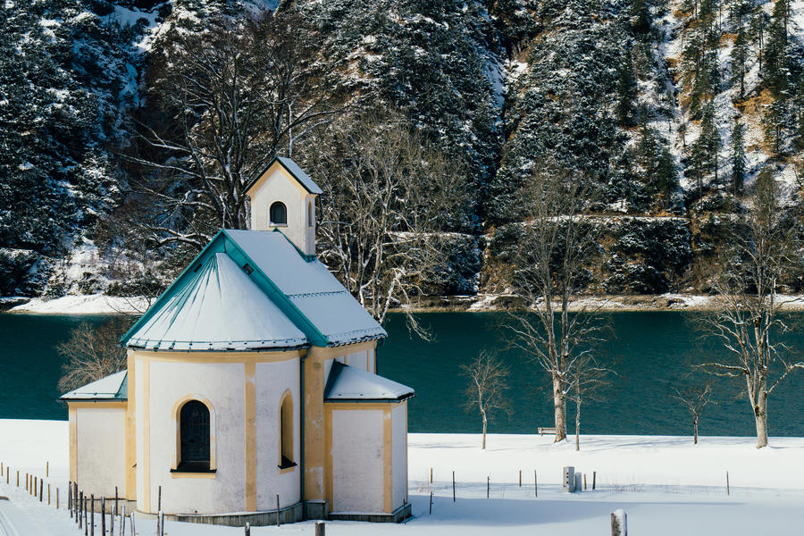 A church by the Achensee lake in the Alps during the winter.