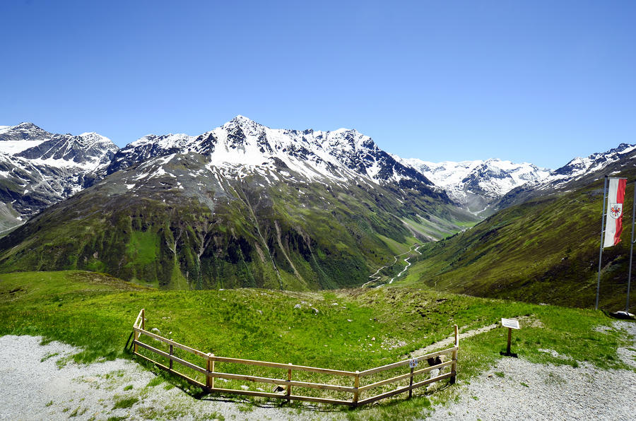 Austria, Tirol, Pitztaler glacier in Austrian alps and Tyrolean flag
