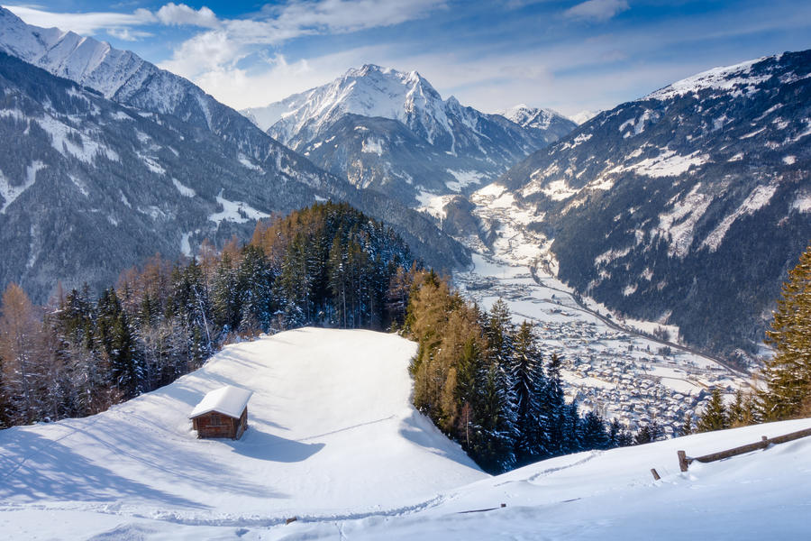 View from the mountain on the wintry Mayrhofen in the ziller valley