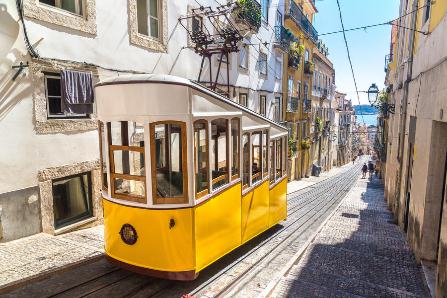 The Gloria Funicular in the city center of Lisbon in a beautiful summer day, Portugal