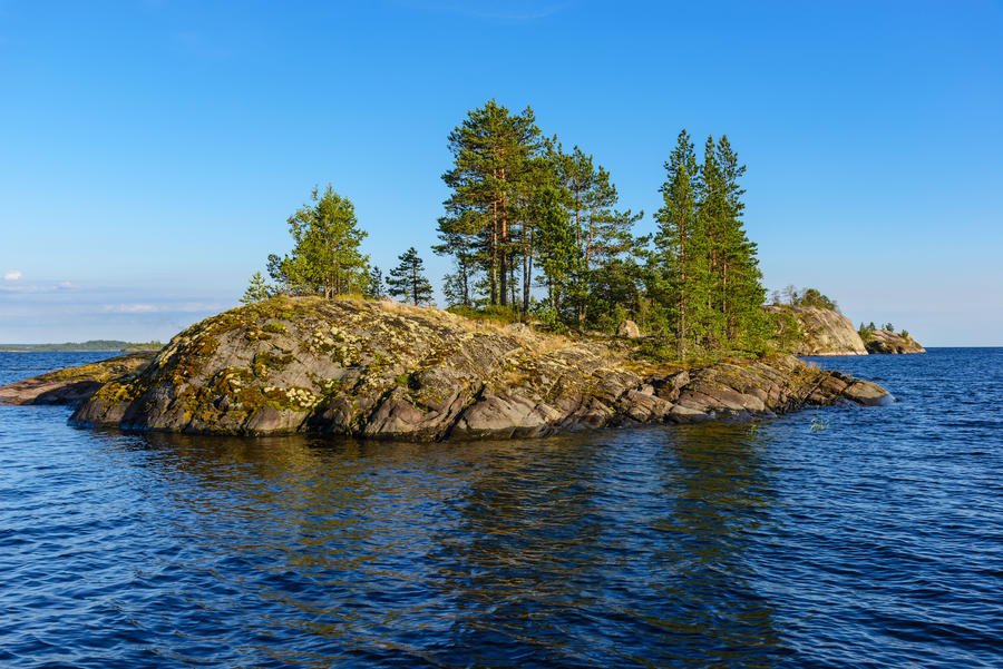 The rounded Ladoga islands, overgrown with pine trees. Ladoga lake skerries, Pitkyaranta, Karelia.