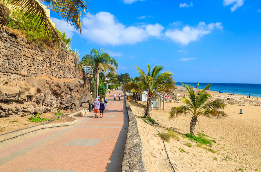 Coastal promenade along sandy beach in Morro Jable town, Fuerteventura, Canary Islands, Spain