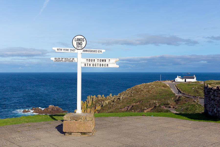 Signpost Land`s End Cornwall UK the most westerly point of England on the Penwith peninsula eight miles from Penzance on the Cornish coast