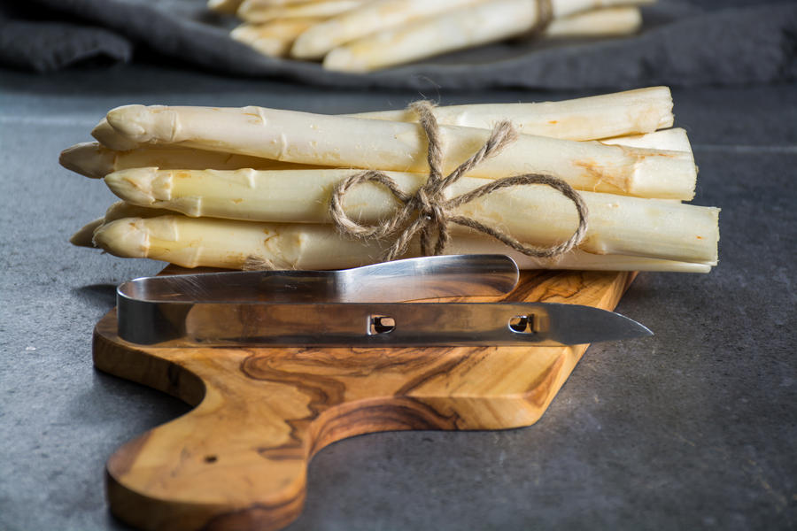 Spring season, new harvest of Dutch, German white asparagus, bunch of raw white asparagus