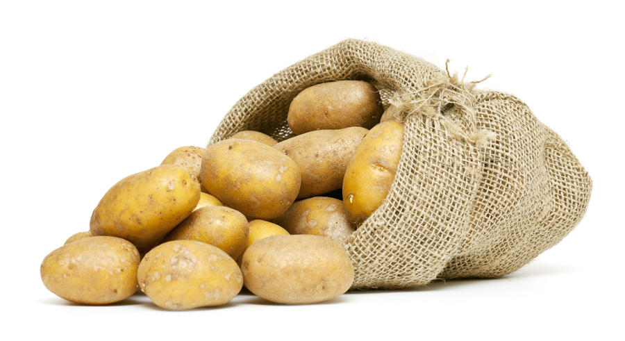 potatoes in burlap bag isolated on white background