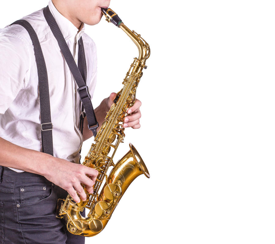 Men playing saxophone. Close up of men playing saxophone