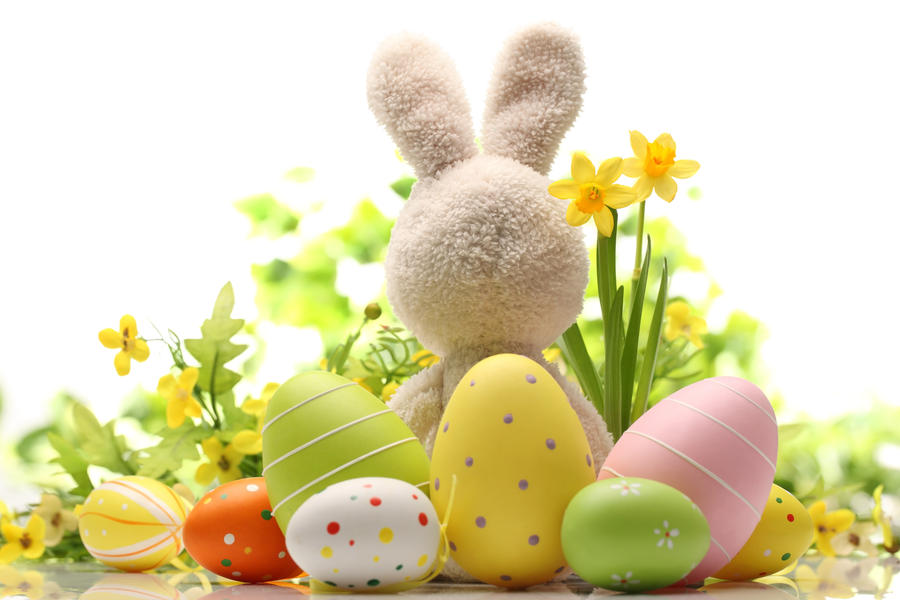 Easter decoration with sugar rabbit,eggs and flowers.