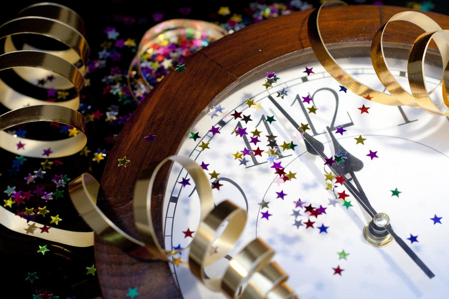 2012 New Years Party Background. Clock and festive tinsels
