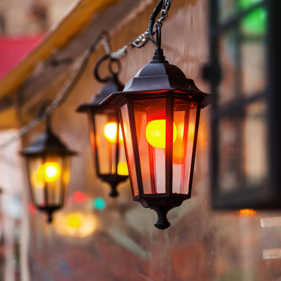 lantern at a tent of a christmas market with colorful light bulbs