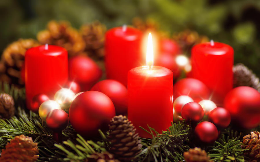 Studio shot of a nice advent wreath with baubles and one burning red candle