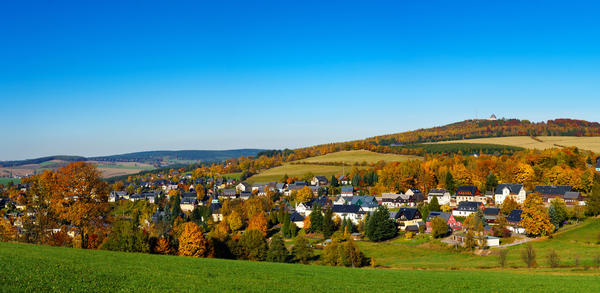 Panorama view Seiffen in Autumn . Saxony Germany ore mountains with blue sky.