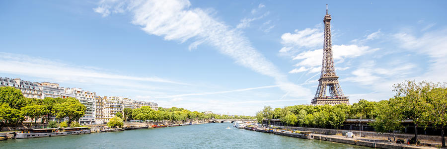 Landscape panoramic view on the Eiffel tower and Seine river during the sunny day in Paris