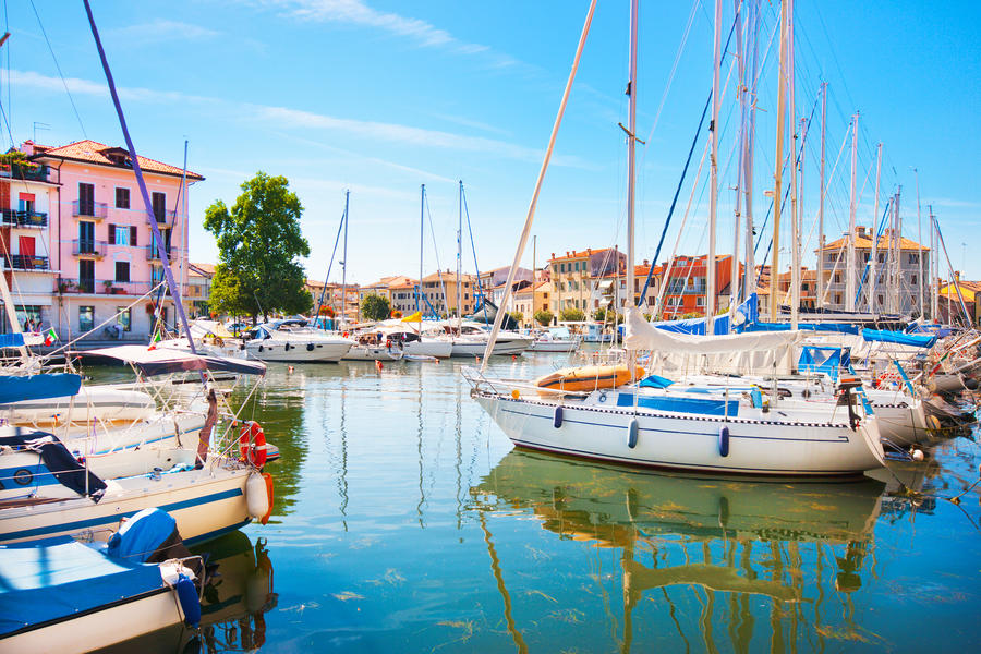 Beautiful scene of boats lying in the harbor of Grado, Friuli-Venezia Giulia, Italy at Adriatic Sea